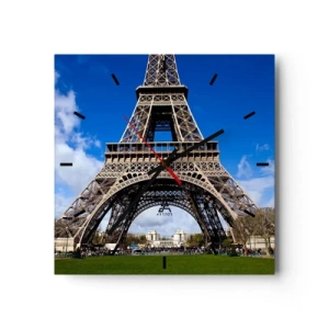 Reloj de pared - Reloj de vidrio - La Torre Eiffel con el cielo azul y un parque verde como fondo. - 30x30cm - Todo París a sus pies - Decoración de pared moderna para salón y dormitorio ARTTOR