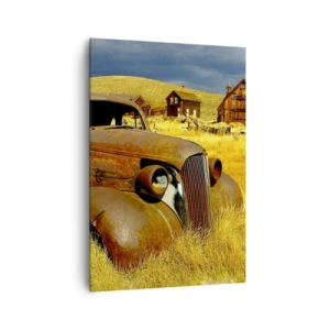 Cuadro sobre lienzo - Impresión de Imagen - Un viejo coche oxidado con el telón de fondo de cabañas de madera abandonadas. - 70x100cm - Un merecido descanso - Decoración de pared moderna para salón y dormitorio ARTTOR