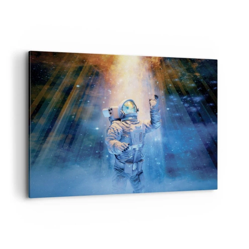 Cuadro sobre lienzo - Impresión de Imagen - Astronauta a la luz de una explosión cósmica llena de estrellas - 100x70cm - El descubrimiento - Decoración de pared moderna para salón y dormitorio ARTTOR