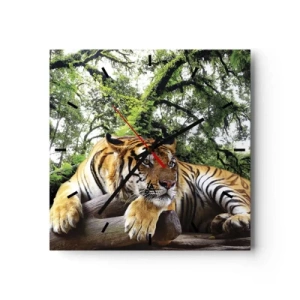 Reloj de pared - Reloj de vidrio - Un tigre descansando en un bosque tropical. - 30x30cm - Atentamente - Decoración de pared moderna para salón y dormitorio ARTTOR