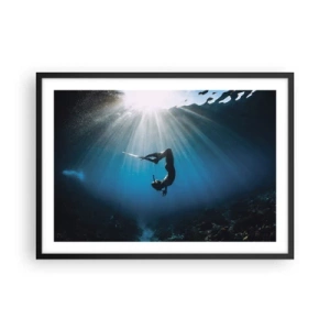 Póster en marco negro - Un buzo flotando en un haz de luz bajo el agua. - 70x50cm - Danza subacuática - Decoración de pared moderna para salón y dormitorio ARTTOR