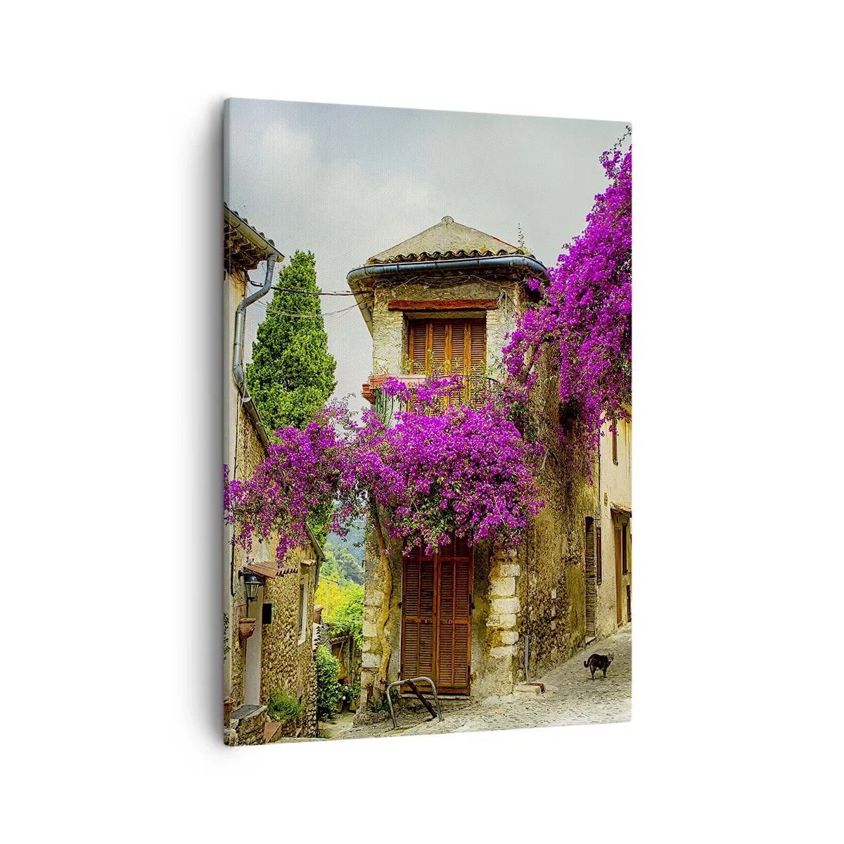 Cuadro sobre lienzo - Impresión de Imagen - Una calle de piedra con flores rosas y casas. - 50x70cm - Bajo un manto de flores - Decoración de pared moderna para salón y dormitorio ARTTOR
