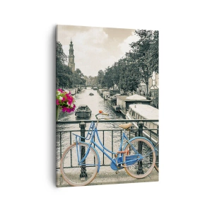 Cuadro sobre lienzo - Impresión de Imagen - Un puente con bicicletas y flores sobre un canal en Ámsterdam. - 50x70cm - Los colores de una calle de Ámsterdam - Decoración de pared moderna para salón y dormitorio ARTTOR