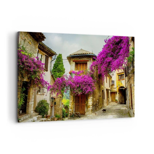 Cuadro sobre lienzo - Impresión de Imagen - Una calle de piedra con flores rosas y casas. - 100x70cm - Bajo un manto de flores - Decoración de pared moderna para salón y dormitorio ARTTOR