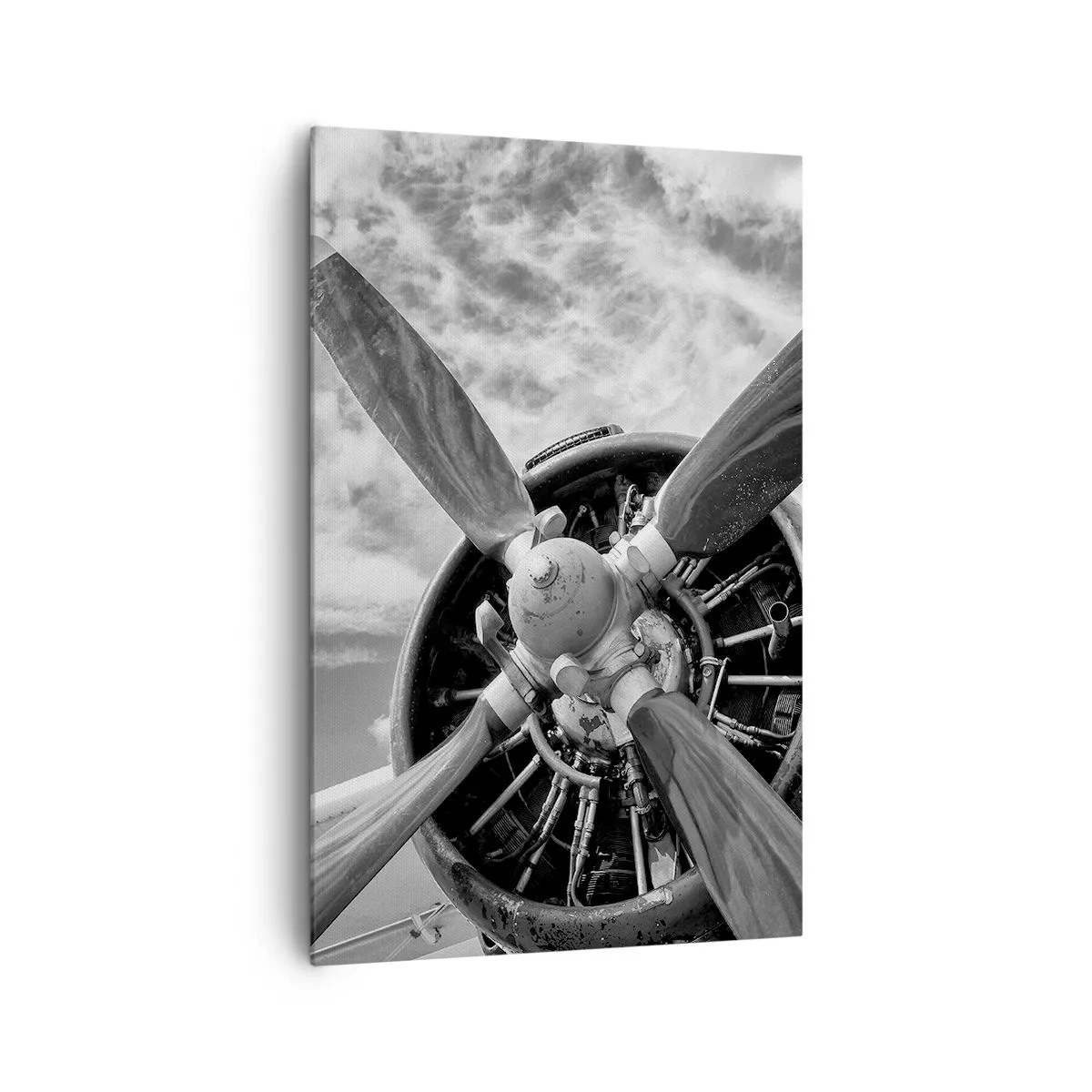 Cuadro sobre lienzo - Impresión de Imagen - Una fotografía en blanco y negro de la hélice de un avión contra un cielo dinámico. - 80x120cm - Conquistador de los cielos - Decoración de pared moderna para salón y dormitorio ARTTOR