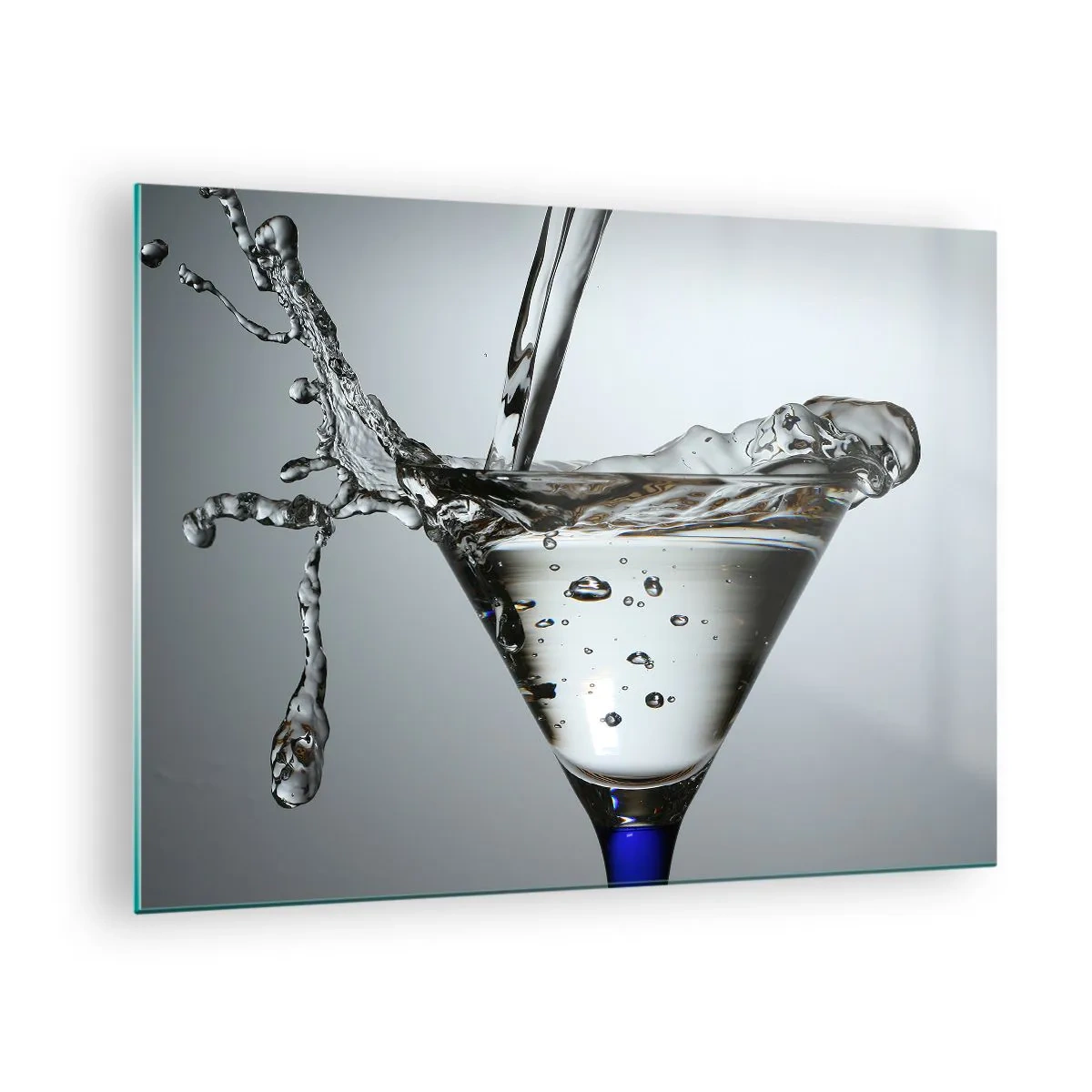 Cuadro sobre vidrio - Impresiones sobre Vidrio - Líquido en una copa de martini salpicando contra un fondo gris - 70x50cm - Sobre el borde de una taza - Decoración de pared moderna para salón y dormitorio ARTTOR