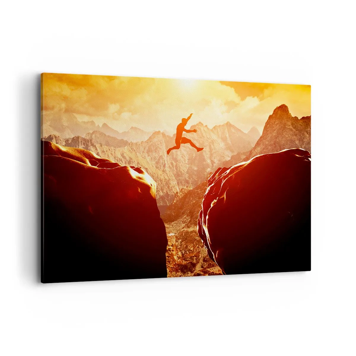 Cuadro sobre lienzo - Impresión de Imagen - Una figura saltando entre rocas con montañas al fondo. - 120x80cm - Pasando el límite - Decoración de pared moderna para salón y dormitorio ARTTOR