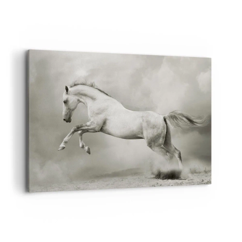 Cuadro sobre lienzo - Impresión de Imagen - Un caballo blanco en un salto dinámico sobre un fondo de nubes brumosas. - 100x70cm - Entre la realidad y el sueño - Decoración de pared moderna para salón y dormitorio ARTTOR