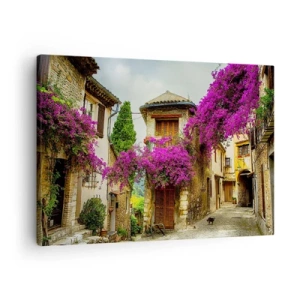 Cuadro sobre lienzo - Impresión de Imagen - Una calle de piedra con flores rosas y casas. - 70x50cm - Bajo un manto de flores - Decoración de pared moderna para salón y dormitorio ARTTOR
