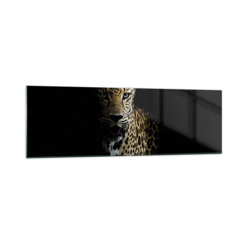 Cuadro sobre vidrio - Impresiones sobre Vidrio - Un leopardo sobre un fondo oscuro con una mirada intensa. - 160x50cm - Belleza oscura - Decoración de pared moderna para salón y dormitorio ARTTOR