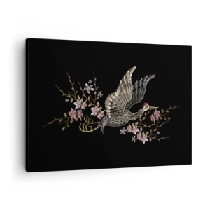 Cuadro sobre lienzo - Impresión de Imagen - Un pájaro en vuelo con flores sobre un fondo negro. - 70x50cm - Ave florida - Decoración de pared moderna para salón y dormitorio ARTTOR