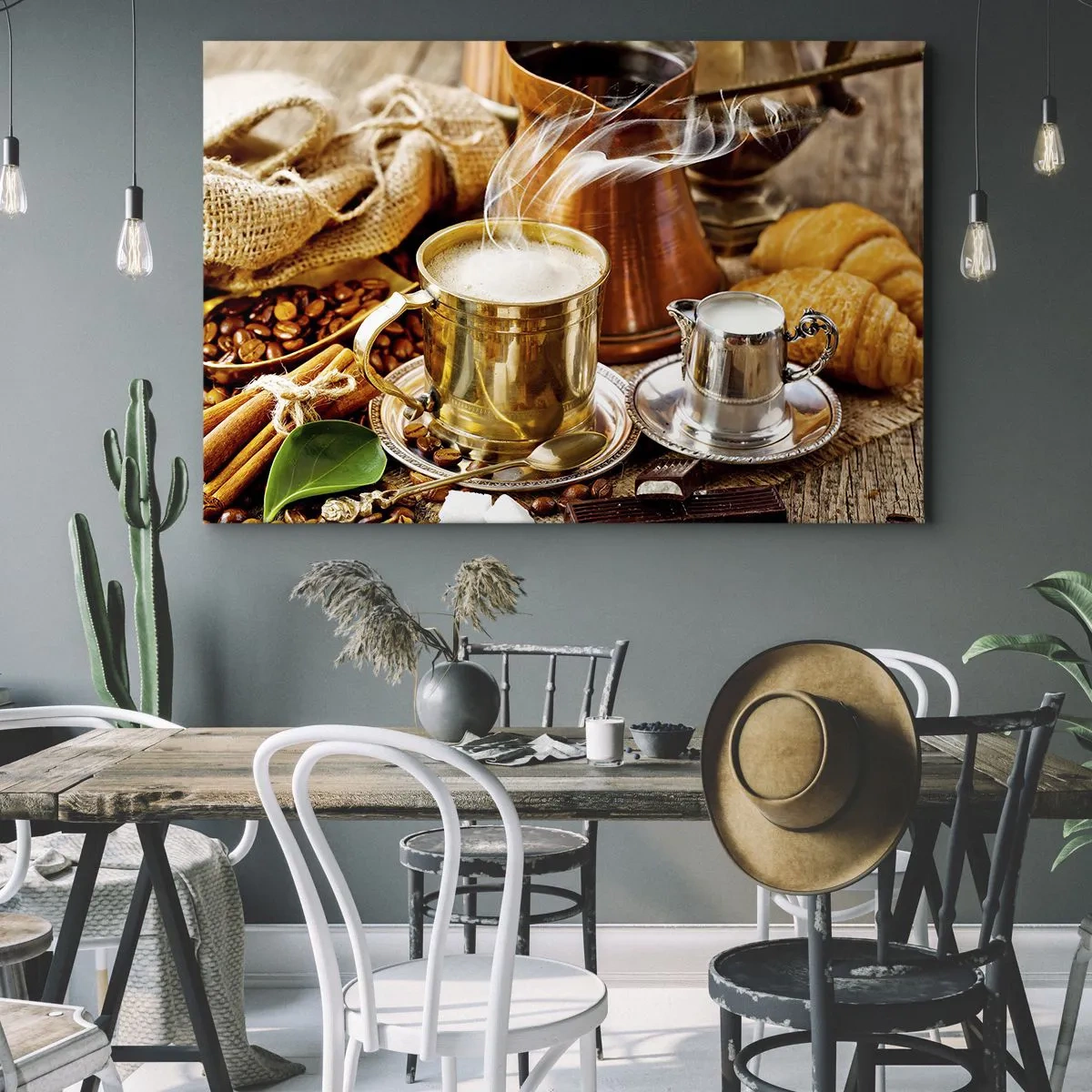 Cuadro sobre lienzo - Impresión de Imagen - Una taza de café dorada rodeada de granos, jarras y croissants. - 70x50cm - Que tengas un buen día - Decoración de pared moderna para salón y dormitorio ARTTOR