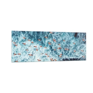 Cuadro sobre vidrio - Impresiones sobre Vidrio - Una vista aérea de flamencos rosados sobre un océano azul. - 140x50cm - Un desfile marítimo - Decoración de pared moderna para salón y dormitorio ARTTOR
