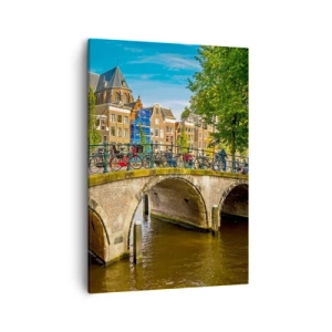 Cuadro sobre lienzo - Impresión de Imagen - Un pintoresco canal con un puente en Ámsterdam. - 50x70cm - Primavera en el canal - Decoración de pared moderna para salón y dormitorio ARTTOR