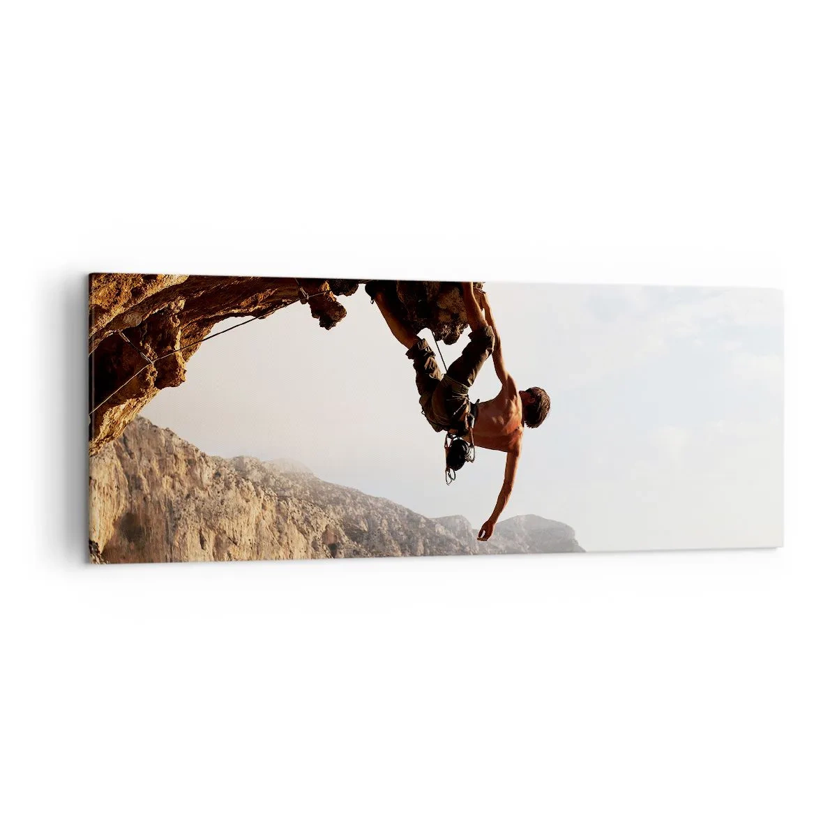 Cuadro sobre lienzo - Impresión de Imagen - Un escalador en un acantilado escarpado en las montañas bajo el sol. - 140x50cm - Un mundo en la roca - Decoración de pared moderna para salón y dormitorio ARTTOR