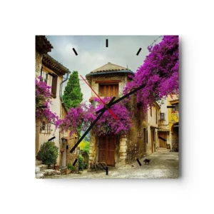 Reloj de pared - Reloj de vidrio - Una calle de piedra con flores rosas y casas. - 30x30cm - Bajo un manto de flores - Decoración de pared moderna para salón y dormitorio ARTTOR