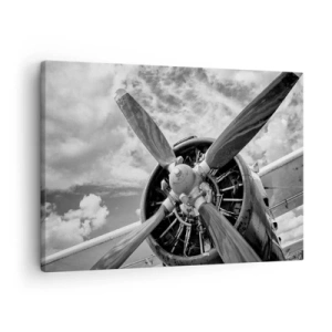 Cuadro sobre lienzo - Impresión de Imagen - Una fotografía en blanco y negro de la hélice de un avión contra un cielo dinámico. - 70x50cm - Conquistador de los cielos - Decoración de pared moderna para salón y dormitorio ARTTOR