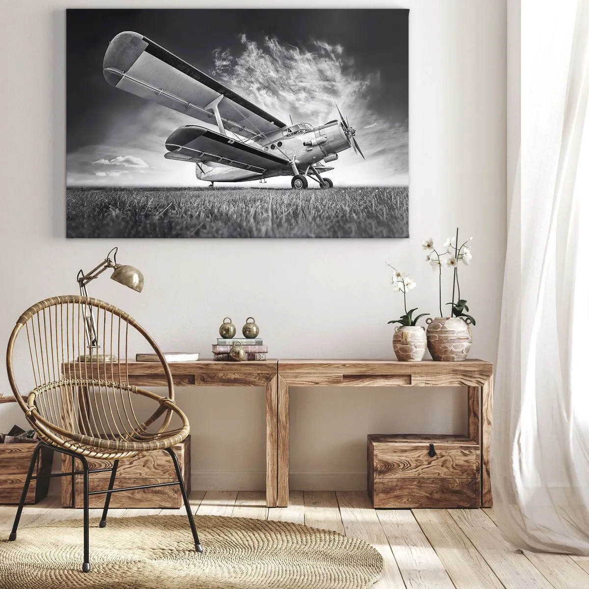 Cuadro sobre lienzo - Impresión de Imagen - Un avión contra un cielo dramático en blanco y negro. - 70x50cm - El vagamundo alado - Decoración de pared moderna para salón y dormitorio ARTTOR