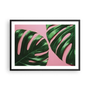 Póster en marco negro - Hojas de monstera verde sobre un fondo rosa - 70x50cm - Cita con el verde - Decoración de pared moderna para salón y dormitorio ARTTOR