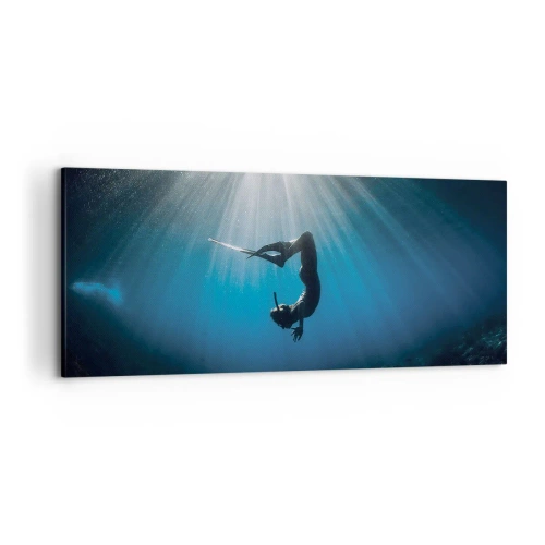 Cuadro sobre lienzo - Impresión de Imagen - Un buzo flotando en un haz de luz bajo el agua. - 120x50cm - Danza subacuática - Decoración de pared moderna para salón y dormitorio ARTTOR