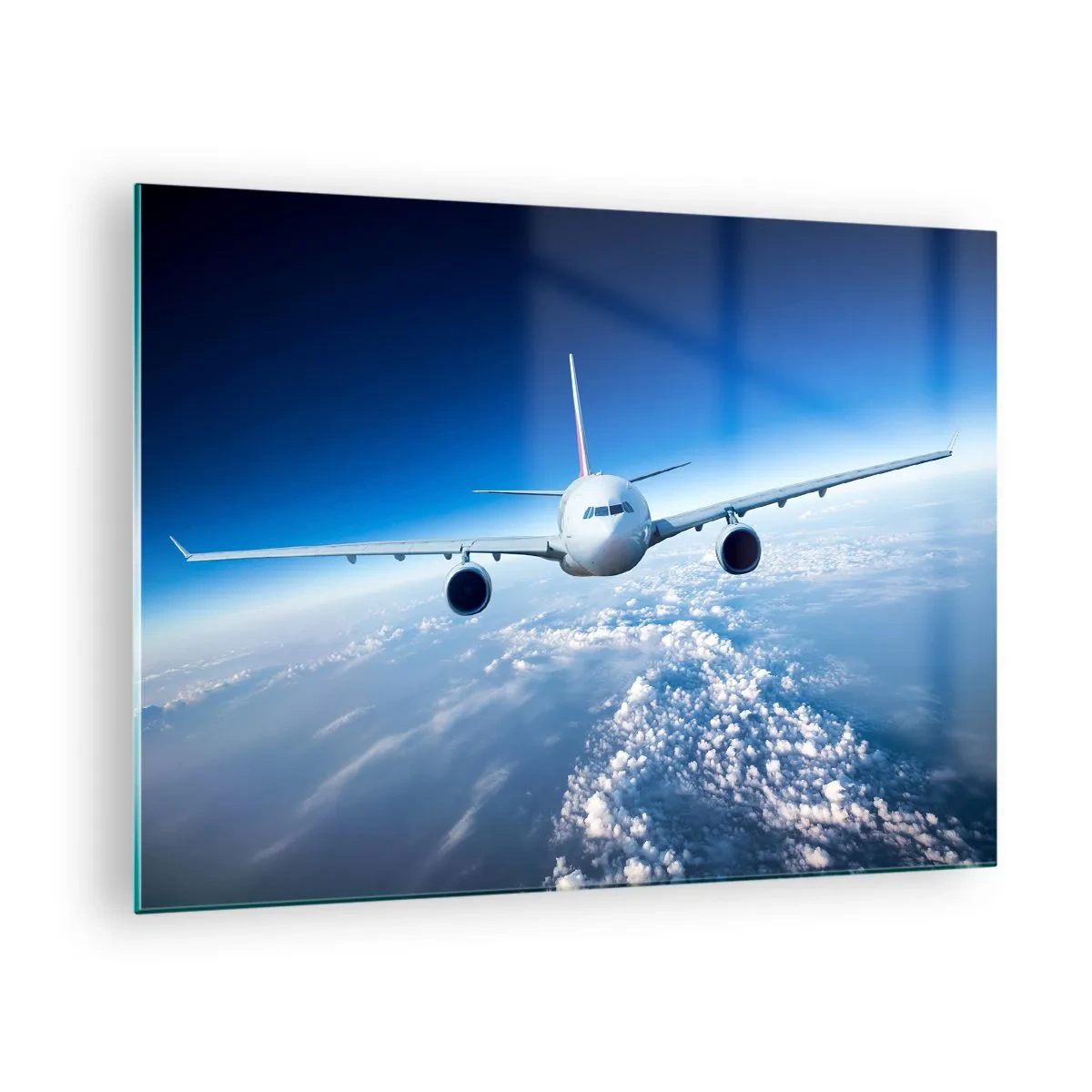Cuadro sobre vidrio - Impresiones sobre Vidrio - Un avión de pasajeros contra un cielo azul y nubes. - 70x50cm - Vuelo porque quiero - Decoración de pared moderna para salón y dormitorio ARTTOR