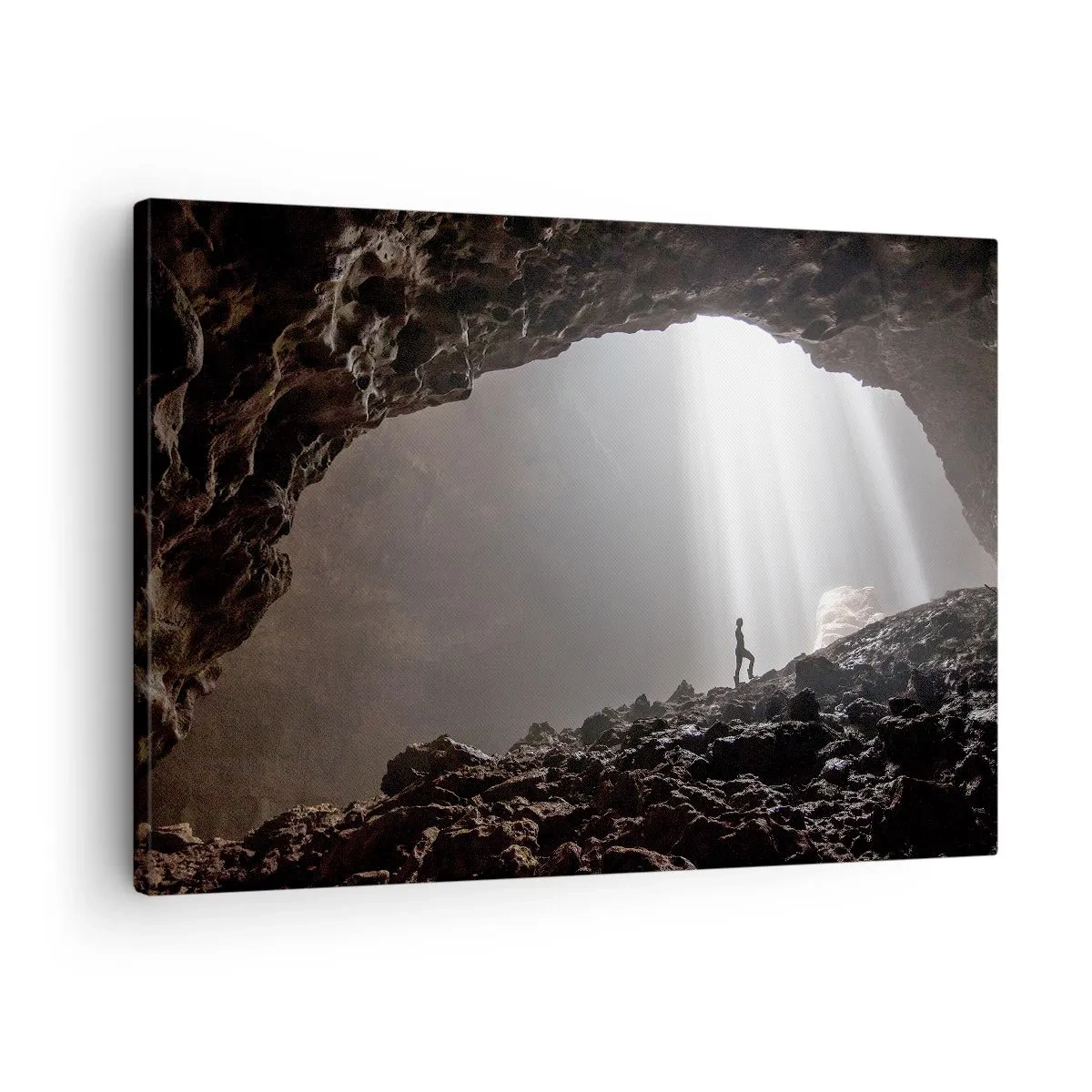 Cuadro sobre lienzo - Impresión de Imagen - Una figura en una cueva iluminada por rayos de luz. - 70x50cm - Gruta luminosa - Decoración de pared moderna para salón y dormitorio ARTTOR
