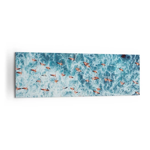 Cuadro sobre lienzo - Impresión de Imagen - Una vista aérea de flamencos rosados sobre un océano azul. - 160x50cm - Un desfile marítimo - Decoración de pared moderna para salón y dormitorio ARTTOR