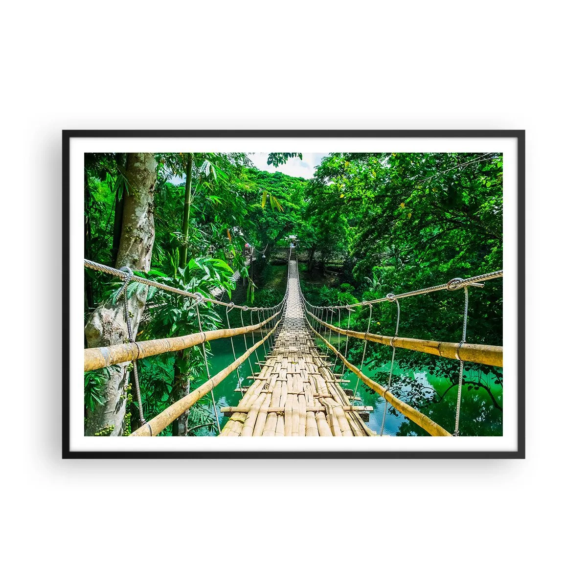 Póster en marco negro - Un puente colgante de bambú rodeado de vegetación. - 100x70cm - Puente colgante sobre la vegetación - Decoración de pared moderna para salón y dormitorio ARTTOR