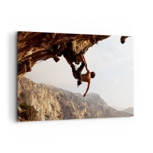 Cuadro sobre lienzo - Impresión de Imagen - Un escalador en un acantilado escarpado en las montañas bajo el sol. - 100x70cm - Un mundo en la roca - Decoración de pared moderna para salón y dormitorio ARTTOR