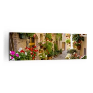 Cuadro sobre lienzo - Impresión de Imagen - Una calle con flores en macetas y muros de piedra. - 160x50cm - En un torrente de flores - Decoración de pared moderna para salón y dormitorio ARTTOR