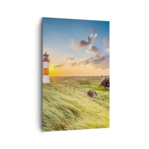 Cuadro sobre lienzo - Impresión de Imagen - Un faro con prados y casas al sol al fondo. - 80x120cm - Entre las olas - Decoración de pared moderna para salón y dormitorio ARTTOR