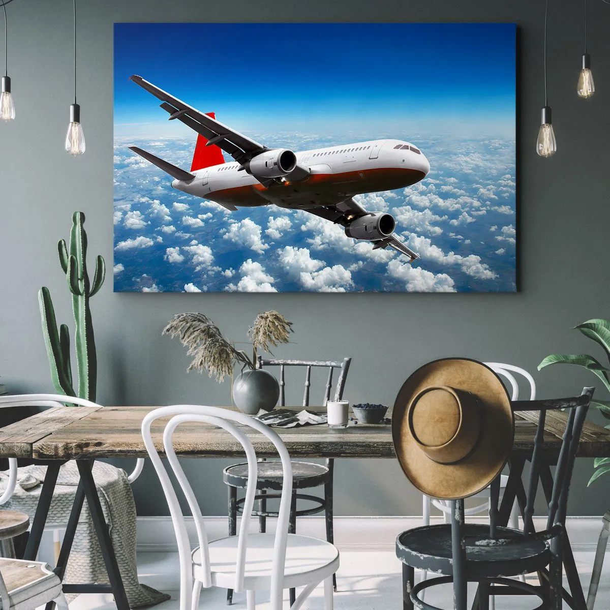 Cuadro sobre lienzo - Impresión de Imagen - Un avión de pasajeros volando sobre las nubes contra un cielo azul. - 70x50cm - Aléjese de todo - Decoración de pared moderna para salón y dormitorio ARTTOR