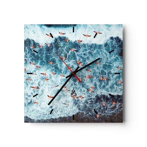 Reloj de pared - Reloj de vidrio - Una vista aérea de flamencos rosados sobre un océano azul. - 30x30cm - Un desfile marítimo - Decoración de pared moderna para salón y dormitorio ARTTOR