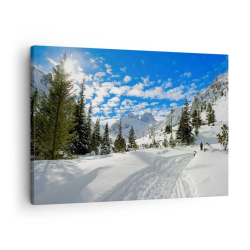 Cuadro sobre lienzo - Impresión de Imagen - Paisaje invernal de montaña con un bosque y un camino en la nieve. - 70x50cm - Nieve y sol - Decoración de pared moderna para salón y dormitorio ARTTOR