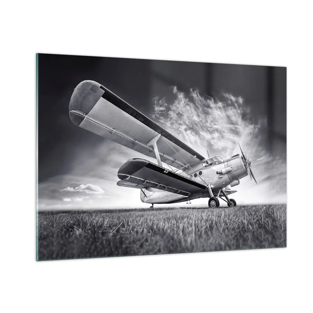 Cuadro sobre vidrio - Impresiones sobre Vidrio - Una fotografía en blanco y negro de un avión contra un cielo espectacular. - 100x70cm - El vagamundo alado - Decoración de pared moderna para salón y dormitorio ARTTOR