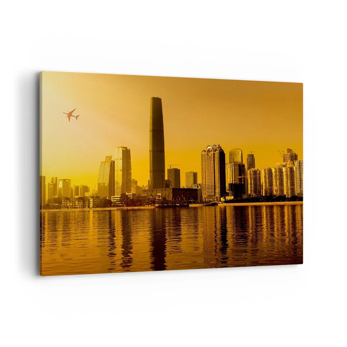 Cuadro sobre lienzo - Impresión de Imagen - Panorama de la ciudad al atardecer con rascacielos y un avión. - 100x70cm - La ciudad dorada - Decoración de pared moderna para salón y dormitorio ARTTOR