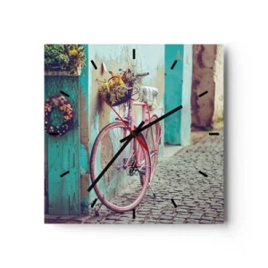 Reloj de pared - Reloj de vidrio - Una bicicleta rosa junto a una puerta turquesa. - 30x30cm - Ahora mismo vuelvo - Decoración de pared moderna para salón y dormitorio ARTTOR