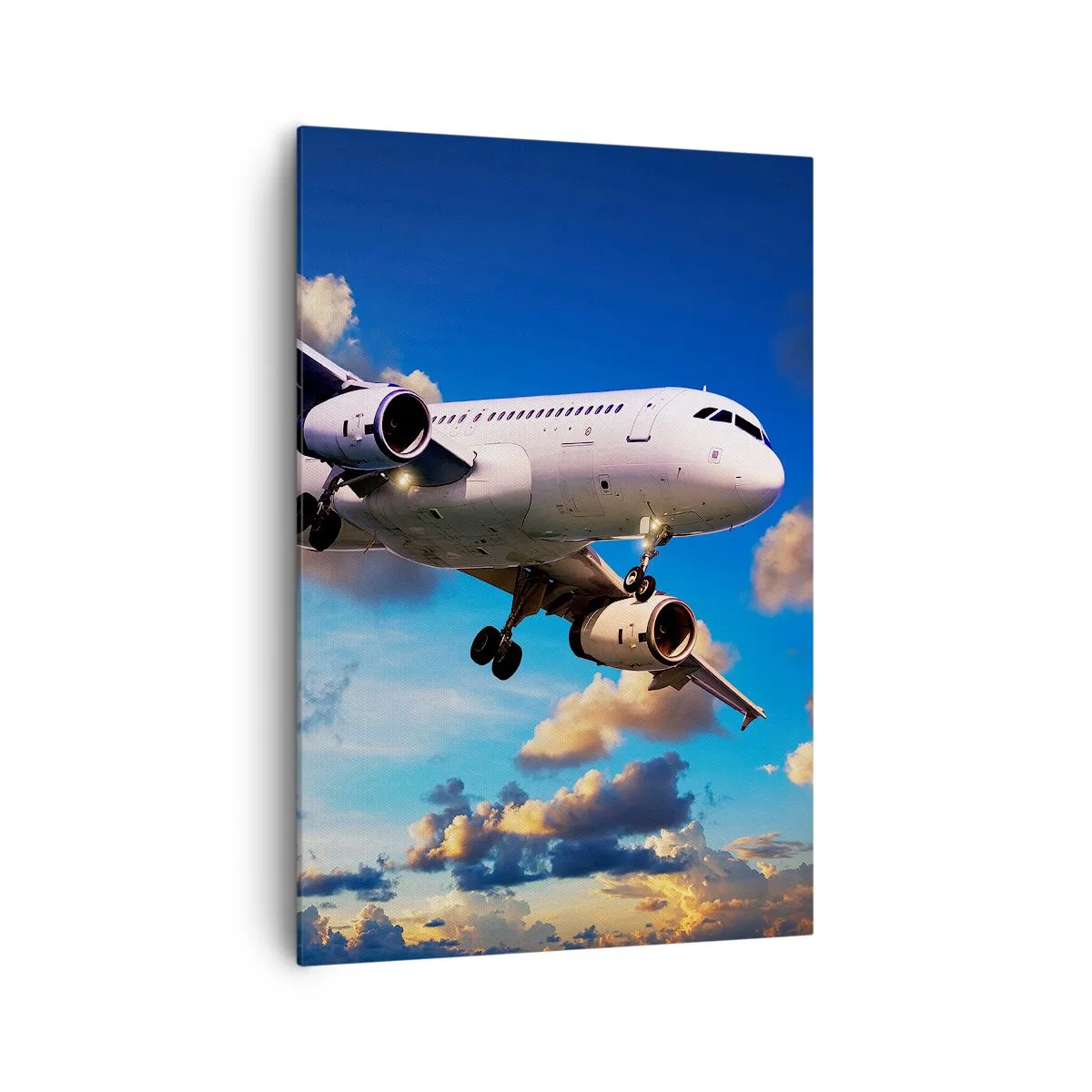 Cuadro sobre lienzo - Impresión de Imagen - Un avión de pasajeros contra las nubes al atardecer. - 70x100cm - Un viaje en blanco y azul - Decoración de pared moderna para salón y dormitorio ARTTOR