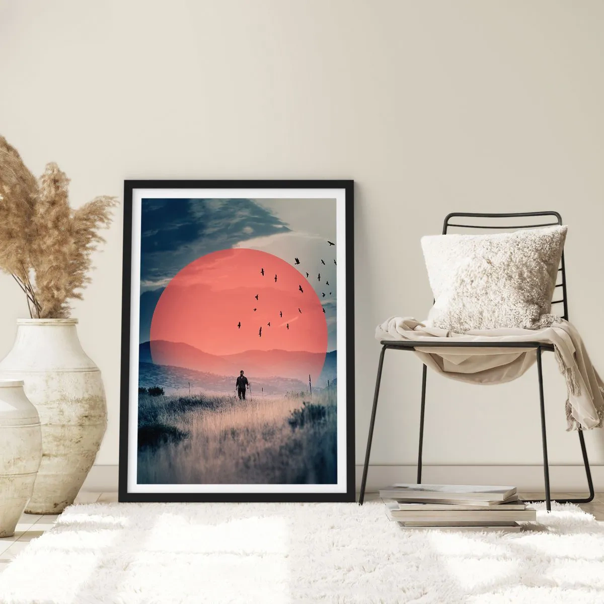 Póster en marco negro - Un hombre caminando por un campo contra un sol rojo. - 50x70cm - En su elemento - Decoración de pared moderna para salón y dormitorio ARTTOR