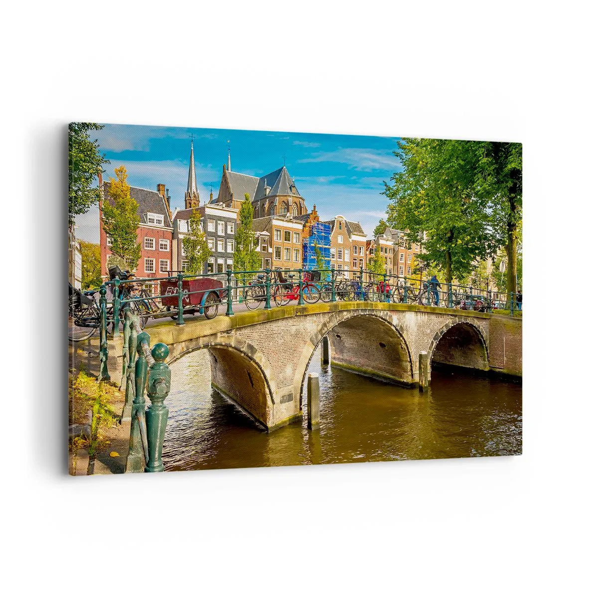 Cuadro sobre lienzo - Impresión de Imagen - Un pintoresco canal con un puente en Ámsterdam. - 100x70cm - Primavera en el canal - Decoración de pared moderna para salón y dormitorio ARTTOR