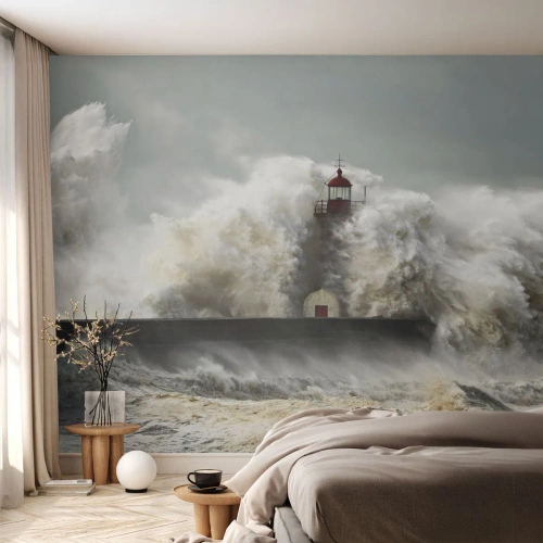 Fotomural Standard Eco - Un faro golpeado por poderosas olas - 100x70cm - La furia del océano - Decoración de pared moderna para salón y dormitorio ARTTOR