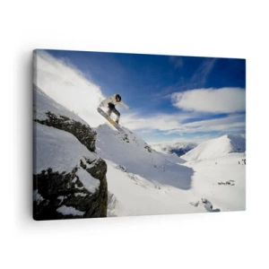 Cuadro sobre lienzo - Impresión de Imagen - Un snowboarder salta desde un acantilado con montañas cubiertas de nieve al fondo. - 70x50cm - Libertad sin fronteras - Decoración de pared moderna para salón y dormitorio ARTTOR