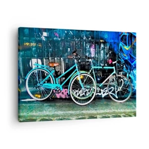 Cuadro sobre lienzo - Impresión de Imagen - Dos bicicletas turquesas sobre un fondo de grafiti urbano. - 70x50cm - La ciudad llama - Decoración de pared moderna para salón y dormitorio ARTTOR