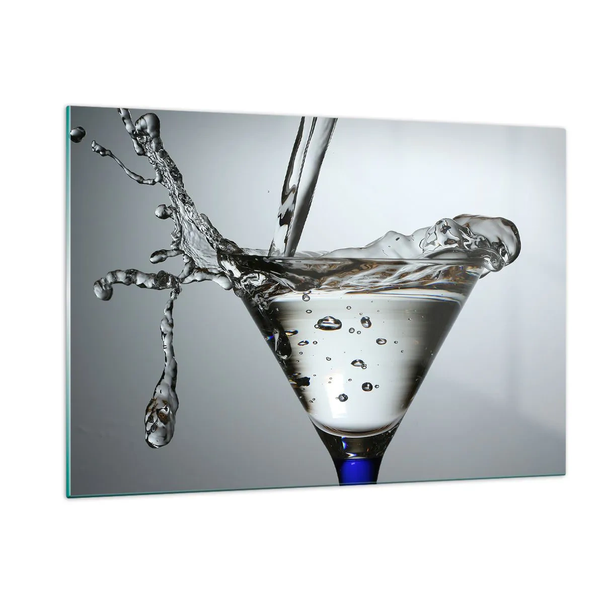 Cuadro sobre vidrio - Impresiones sobre Vidrio - Líquido en una copa de martini salpicando contra un fondo gris - 120x80cm - Sobre el borde de una taza - Decoración de pared moderna para salón y dormitorio ARTTOR