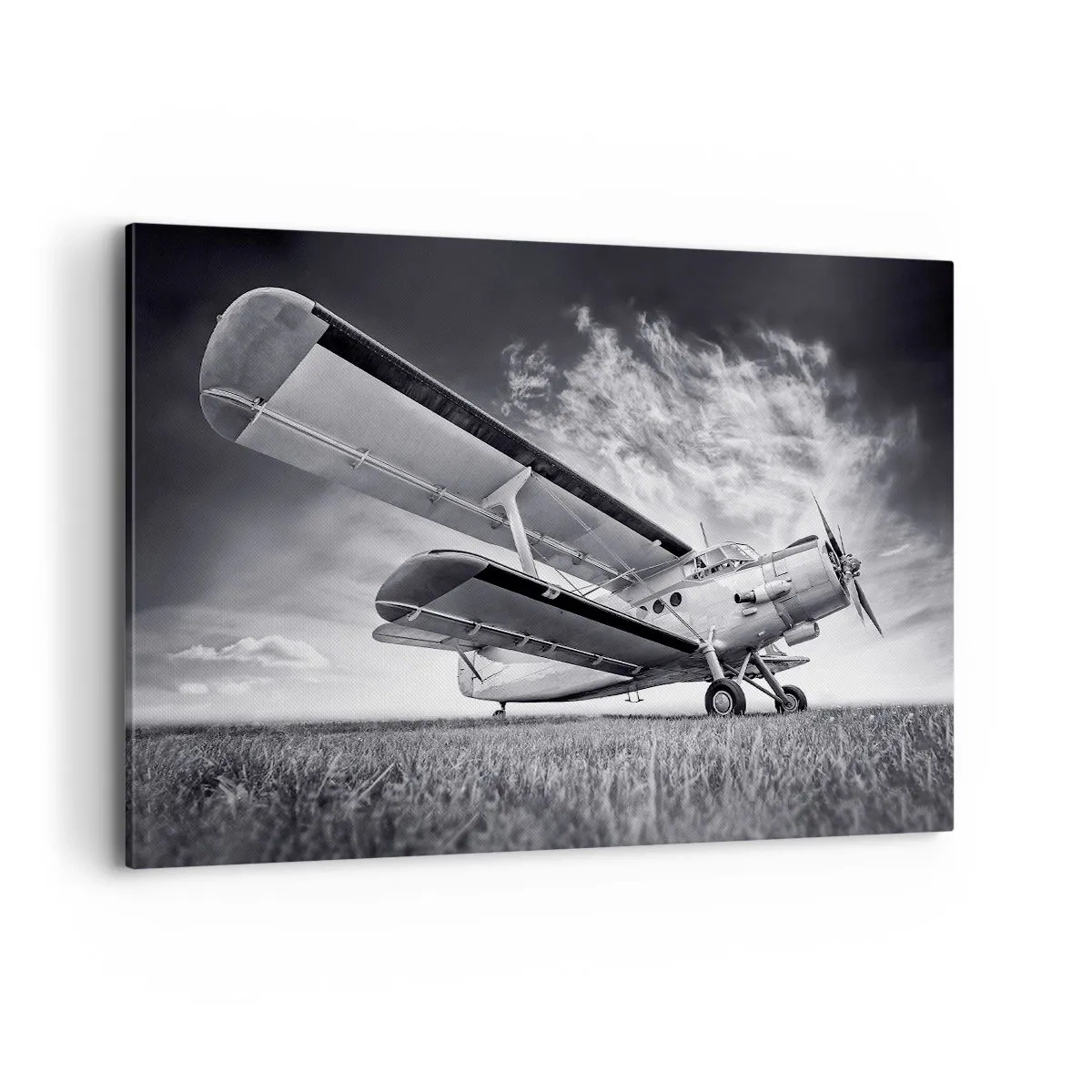 Cuadro sobre lienzo - Impresión de Imagen - Un avión contra un cielo dramático en blanco y negro. - 100x70cm - El vagamundo alado - Decoración de pared moderna para salón y dormitorio ARTTOR